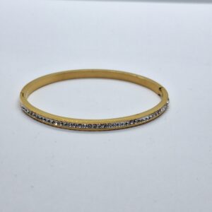 pulsera rígida dorada circonitas